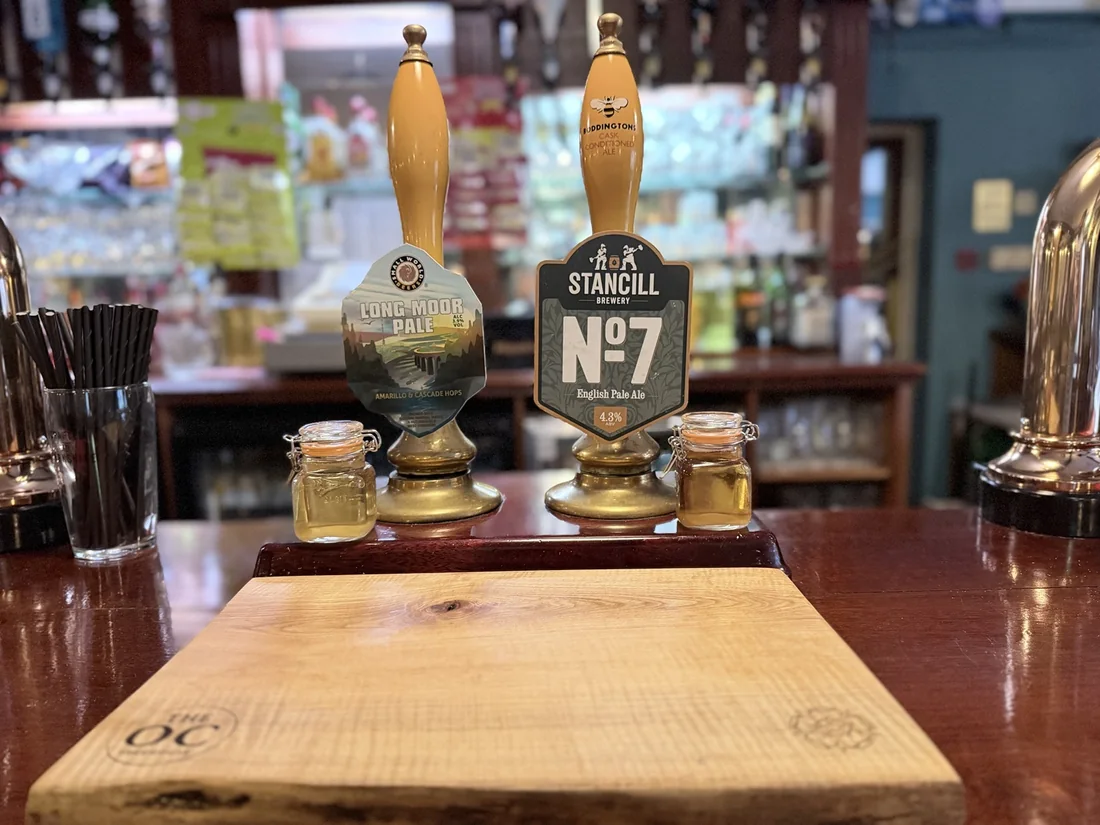 Real ale handpulls on the bar at The OC, Mirfield