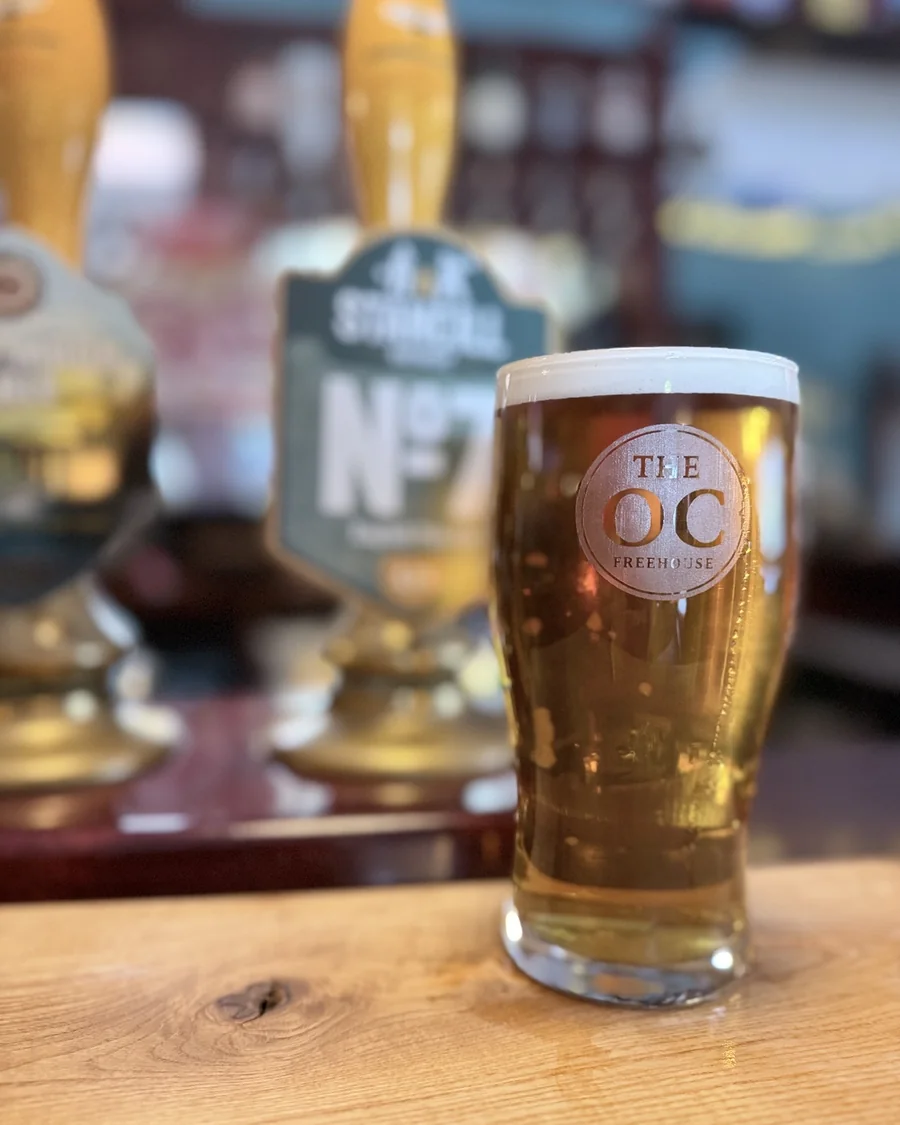 A pint in a branded OC glass